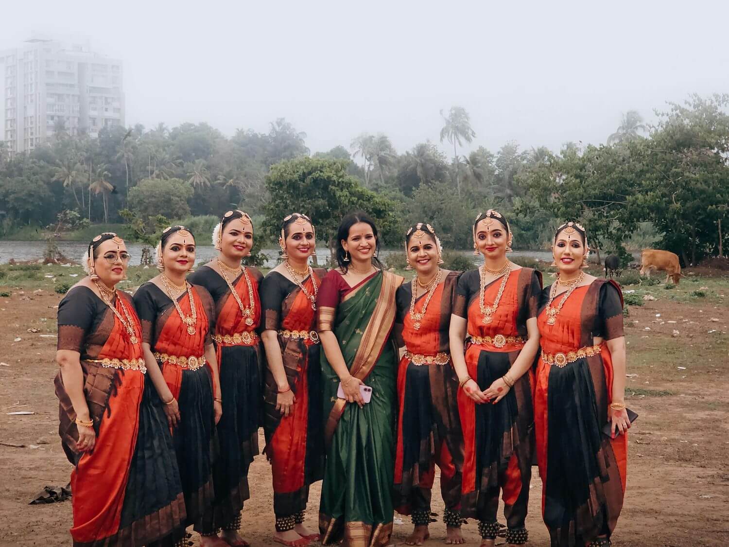 Dancers in blue costume before a performance